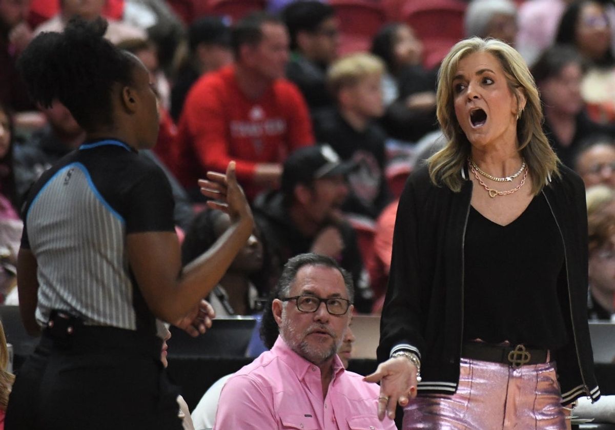 Texas Tech women's basketball coach Krista Gerlich talks to an official in a Big 12 game against Kansas on Tuesday, Feb. 10, 2026, at United Supermarkets Arena.