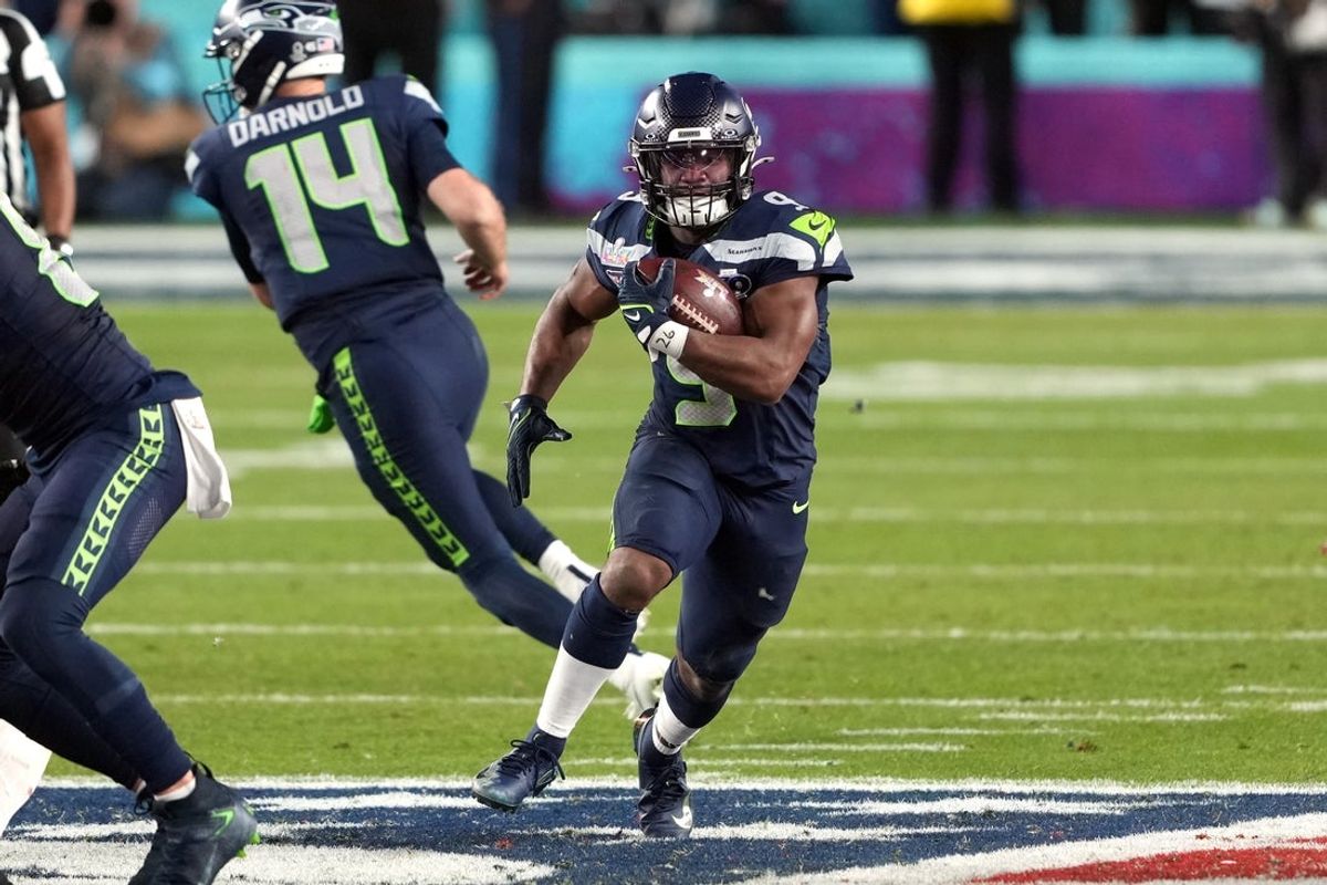 Feb 8, 2026; Santa Clara, CA, USA; Seattle Seahawks running back Kenneth Walker III (9) carries the ball against the New England Patriots during the fourth quarter in Super Bowl LX at Levi's Stadium. Mandatory Credit: Darren Yamashita-Imagn Images