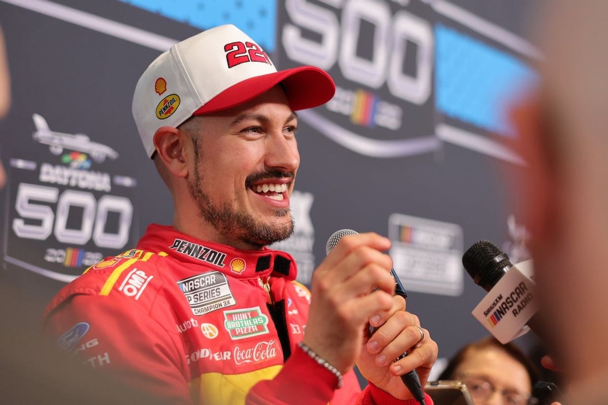 Feb 11, 2026; Daytona Beach, Florida, USA; NASCAR Cup Series driver Joey Logano (22) speaks to the media during the Daytona 500 Media Day at Daytona International Speedway. Mandatory Credit: Mike Dinovo-Imagn Images