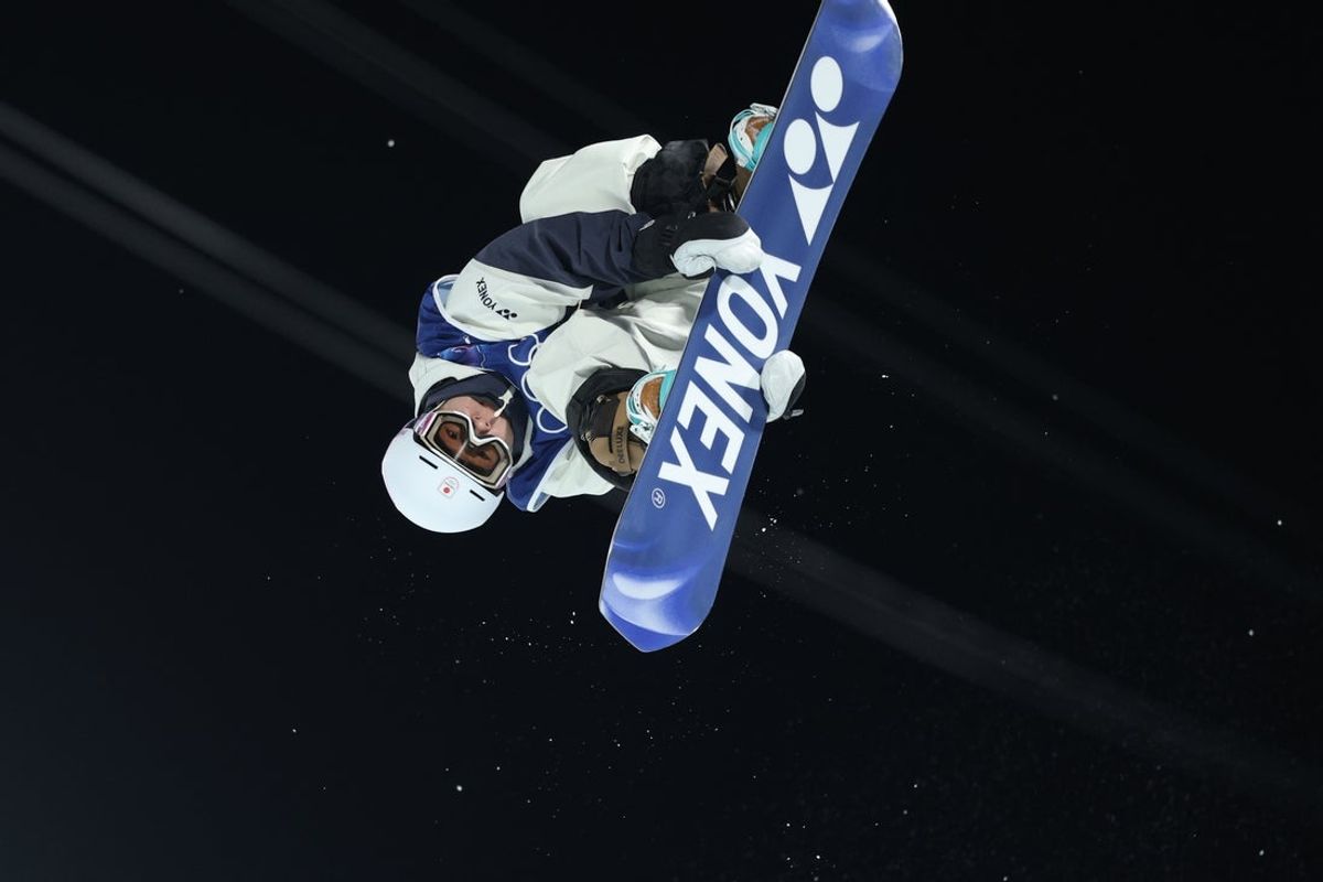 Feb 11, 2026; Livigno, Italy;  Yuto Totsuka of Japan competes in men's snowboarding halfpipe qualification during the Milano Cortina 2026 Olympic Winter Games at Livigno Snow Park. Mandatory Credit: Nathan Ray Seebeck-Imagn Images