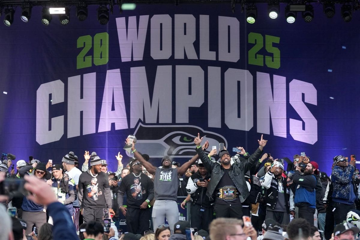 Feb 11, 2026; Seattle, WA, USA; Seattle Seahawks players react during the Super Bowl LX trophy celebration at Lumen Field. Mandatory Credit: Kirby Lee-Imagn Images