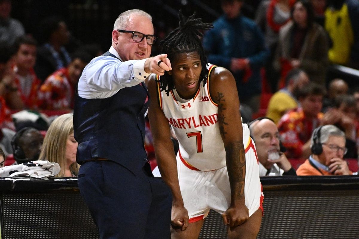 Feb 11, 2026; College Park, Maryland, USA;  Maryland Terrapins head coach Buzz Williams gives instructions to guard Andre Mills (7) in the first half against the Iowa Hawkeyes at Xfinity Center. Mandatory Credit: Jamie Sabau-Imagn Images