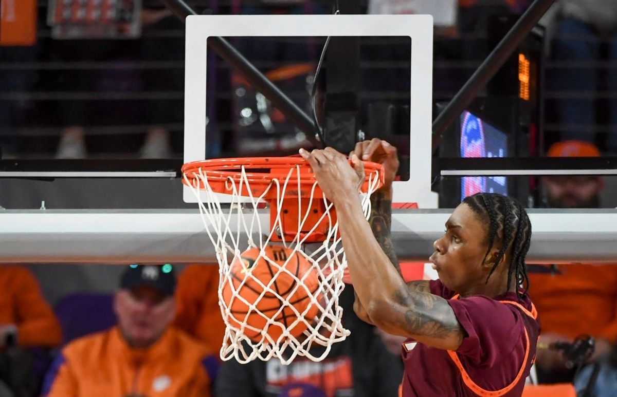 Virginia Tech Hokies forward Tobi Lawal (1) dunks the ball Wednesday, Feb. 11, 2026, during the NCAA men’s basketball game against the Clemson Tigers at Littlejohn Coliseum in Clemson, South Carolina.