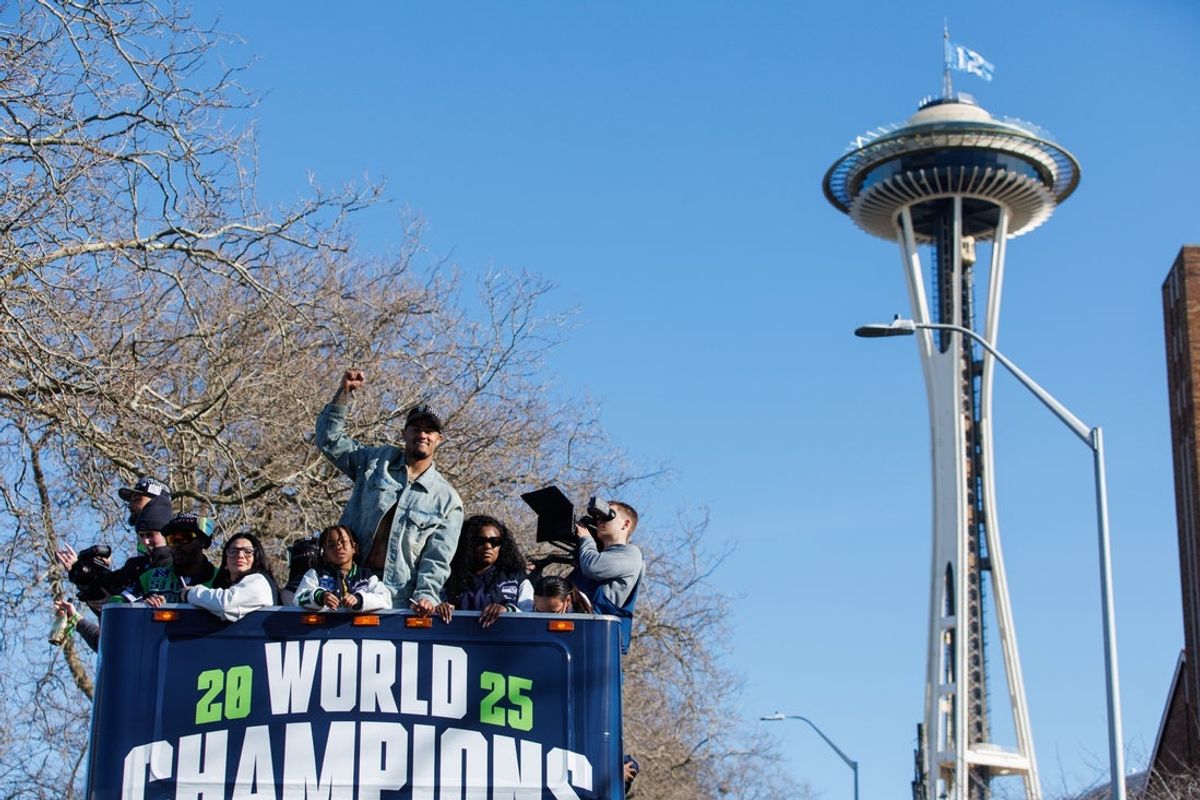 Seattle Seahawks wide receiver Jaxon Smith-Njigba (11) reacts during the Super Bowl LX parade. Mandatory Credit: Kevin Ng-Imagn Images