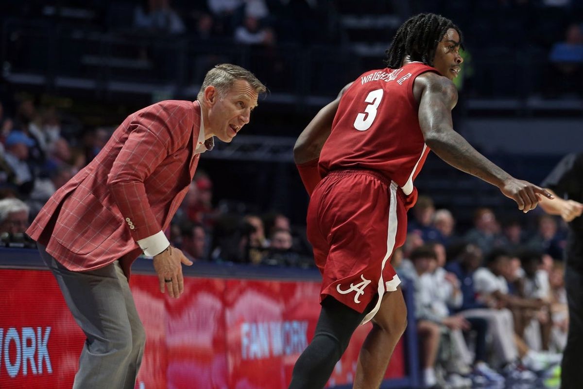 Feb 11, 2026; Oxford, Mississippi, USA; Alabama Crimson Tide head coach Nate Oats reacts with guard Latrell Wrightsell Jr. (3) after a basket during the second half against the Mississippi Rebels at The Sandy and John Black Pavilion at Ole Miss. Mandatory Credit: Petre Thomas-Imagn Images