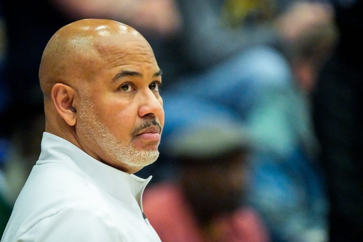 Eastern Michigan University’s coach Stan Heath takes in warmups before the men’s game against Kent, Feb. 11, 2026, at M.A.C. Center in Kent, Ohio.