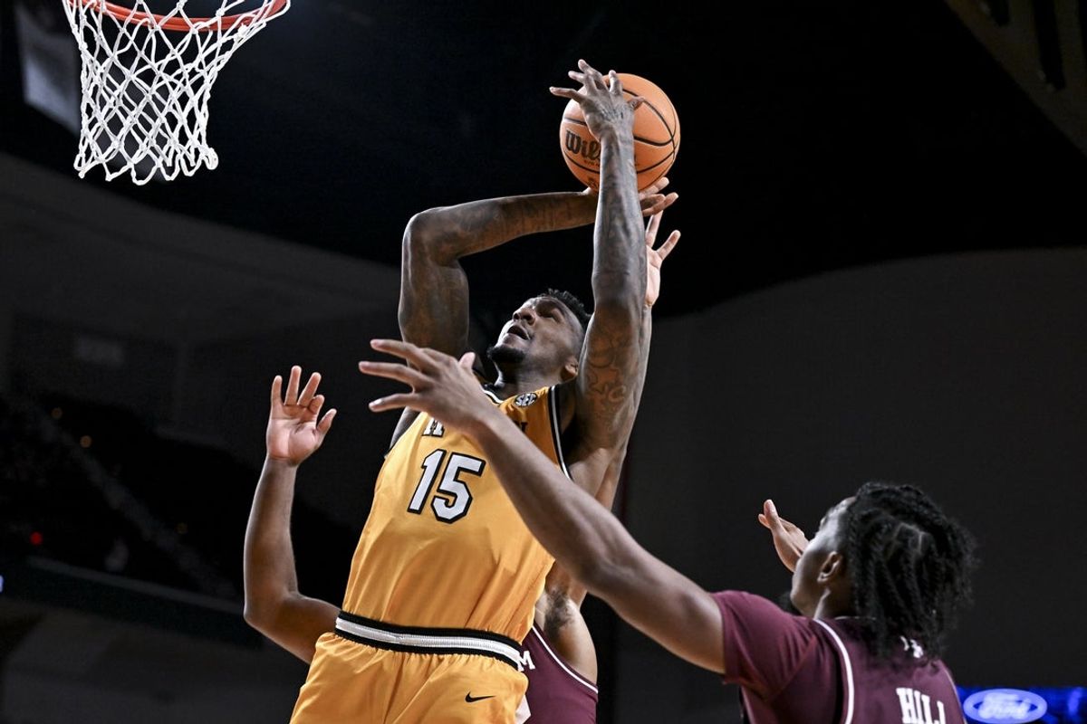 Feb 11, 2026; College Station, Texas, USA; Missouri Tigers center Shawn Phillips Jr. (15) shoots the ball during the first half against the Texas A&M Aggies at Reed Arena. Mandatory Credit: Maria Lysaker-Imagn Images