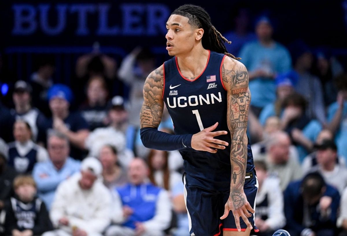 Feb 11, 2026; Indianapolis, Indiana, USA; UConn Huskies guard Solo Ball (1) celebrates after a play against the Butler Bulldogs during the second half at Hinkle Fieldhouse. Mandatory Credit: Robert Goddin-Imagn Images