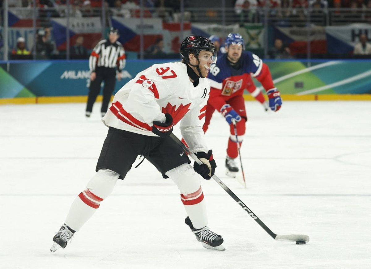 Feb 12, 2026; Milan, Italy; Connor McDavid of Canada in action against Czechia in a men's ice hockey group A match during the Milano Cortina 2026 Olympic Winter Games at Milano Santagiulia Ice Hockey Arena. Mandatory Credit: Geoff Burke-Imagn Images