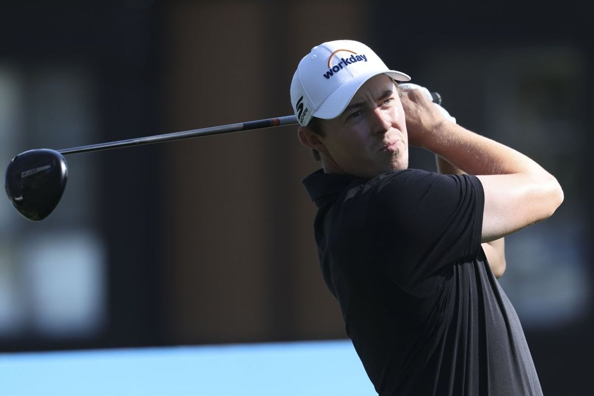 Feb 12, 2026; Pebble Beach, California, USA; Matt Fitzpatrick hits his tee shot on the 18th hole during the first round of the AT&T Pebble Beach Pro-Am golf tournament at Spyglass Hill Golf Course. Mandatory Credit: Kiyoshi Mio-Imagn Images
