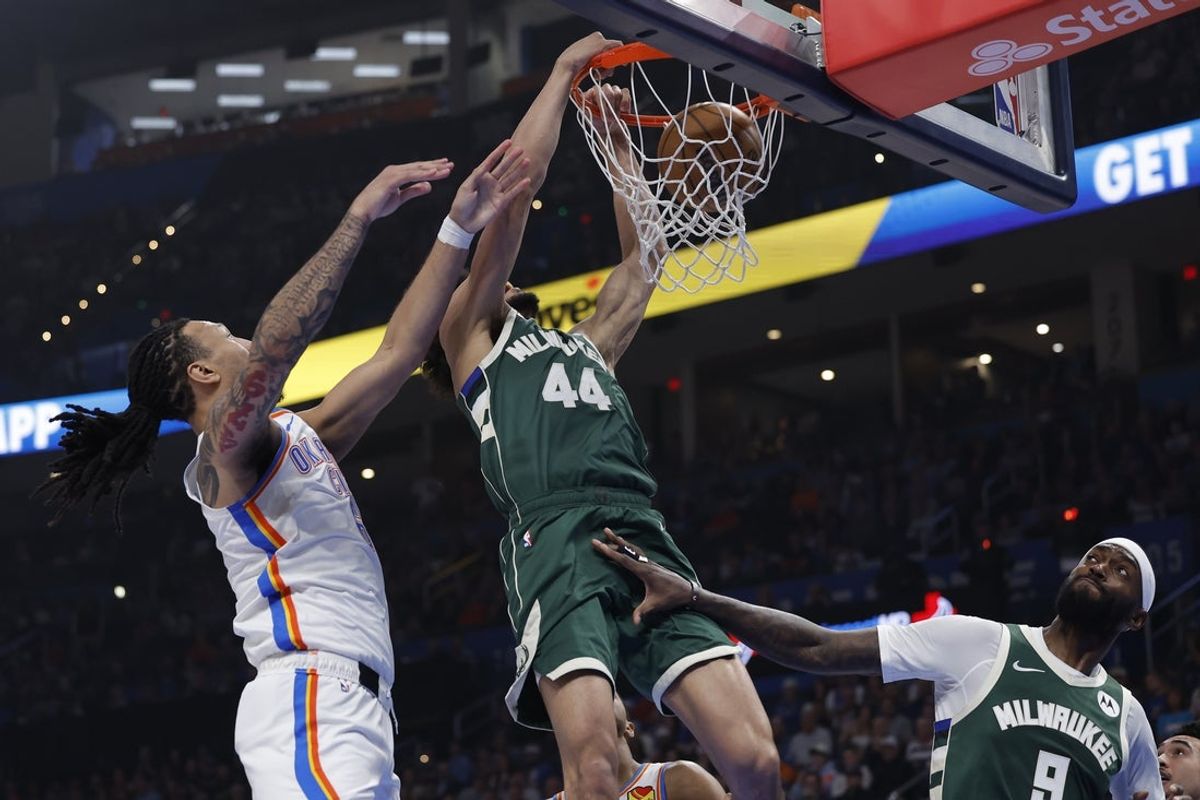 Feb 12, 2026; Oklahoma City, Oklahoma, USA; Milwaukee Bucks guard Andre Jackson Jr. (44) dunks in front of Oklahoma City Thunder forward Jaylin Williams (6) during the first quarter at Paycom Center. Mandatory Credit: Alonzo Adams-Imagn Images