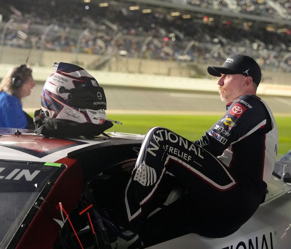 Denny Hamlin gets in his car before the NASCAR Cup Series Duel during Speedweek, Thursday, Feb. 12, 2026.