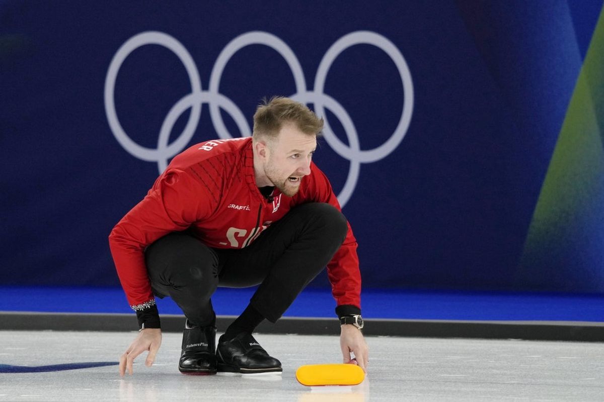 Feb 13, 2026; Cortina d'Ampezzo, Italy; Yannick Schwaller of Switzerland during a men's round robin game during the Milano Cortina 2026 Olympic Winter Games at Cortina Curling Olympic Stadium. Mandatory Credit: Michael Madrid-Imagn Images