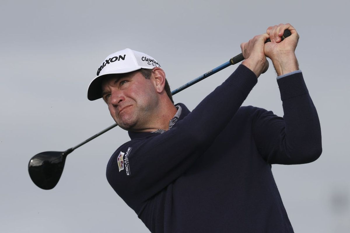Feb 13, 2026; Pebble Beach, California, USA; Lucas Glover hits his tee shot on the 10th hole during the second round of the AT&T Pebble Beach Pro-Am golf tournament at Pebble Beach Golf Links. Mandatory Credit: Kiyoshi Mio-Imagn Images
