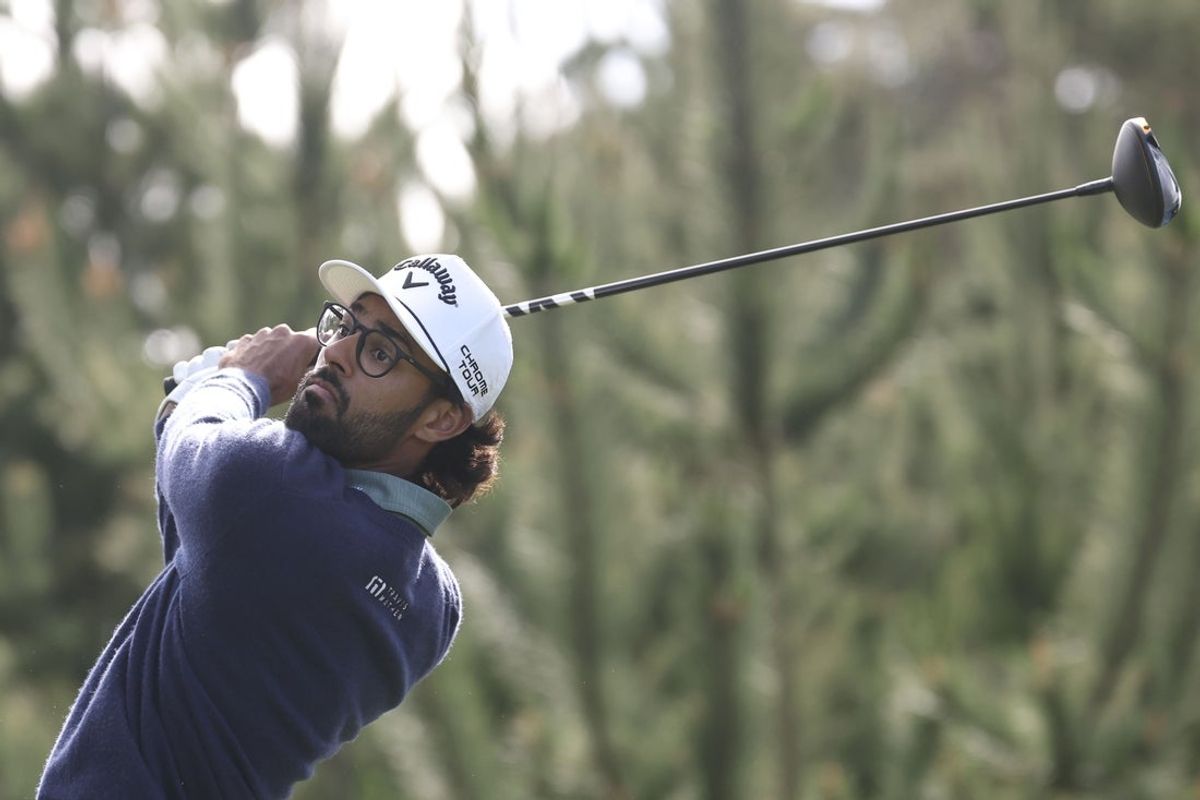Feb 13, 2026; Pebble Beach, California, USA; Akshay Bhatia hits his tee shot on the seventh hole during the second round of the AT&T Pebble Beach Pro-Am golf tournament at Spyglass Hill Golf Course. Mandatory Credit: Kiyoshi Mio-Imagn Images