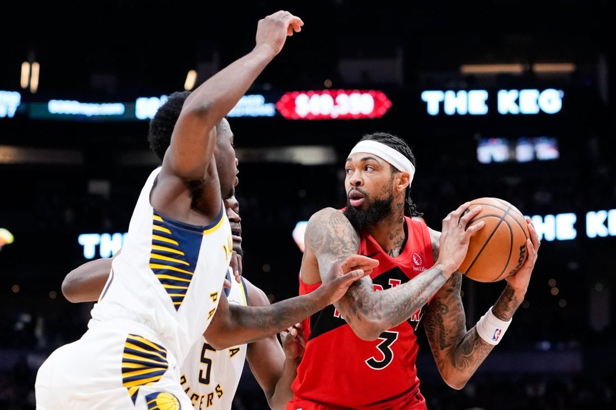 Feb 8, 2026; Toronto, Ontario, CAN;  Toronto Raptors forward Brandon Ingram (3) protects the ball against the Indiana Pacers at Scotiabank Arena. Mandatory Credit: Kevin Sousa-Imagn Images