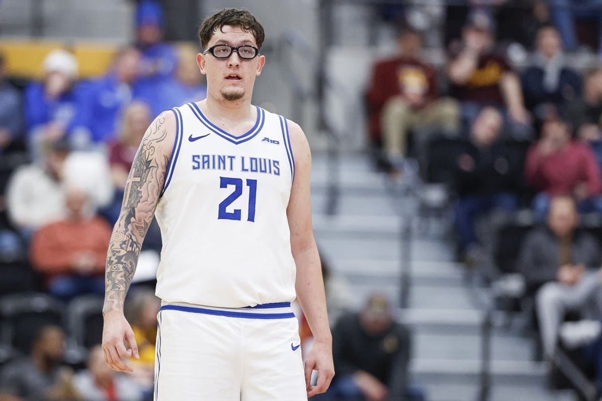 Feb 13, 2026; Chicago, Illinois, USA; Saint Louis Billikens center Robbie Avila (21) stands on the court during the second half at Joseph J. Gentile Arena. Mandatory Credit: Kamil Krzaczynski-Imagn Images
