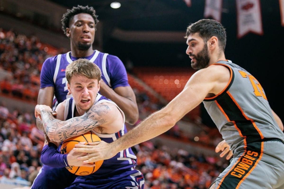 Feb 14, 2026; Stillwater, Oklahoma, USA; TCU Horned Frogs guard Brock Harding (2) guards the ball during the first half against the Oklahoma State Cowboys at Gallagher-Iba Arena. Mandatory Credit: William Purnell-Imagn Images