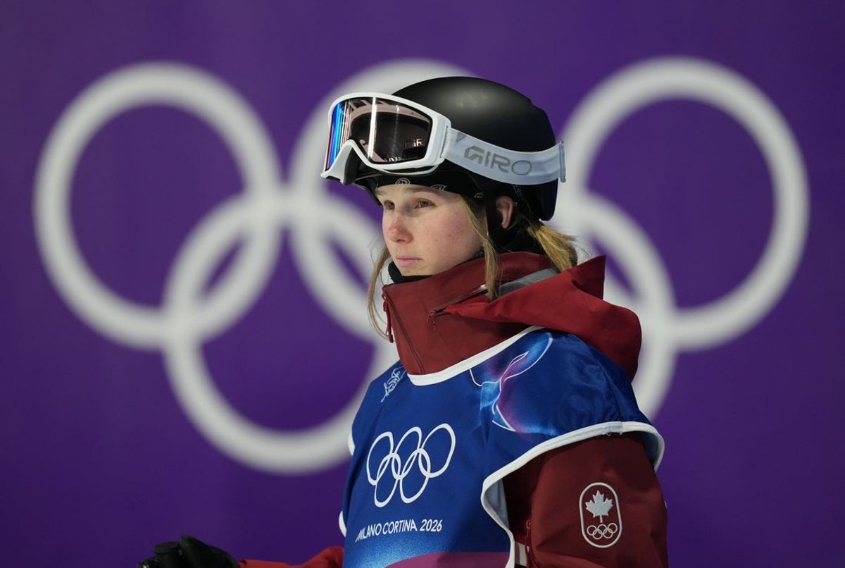 Feb 14, 2026; Livigno, Italy; Megan Oldham of Canada reacts after her first jump in the women's freestyle skiing big air qualification during the Milano Cortina 2026 Olympic Winter Games at Livigno Snow Park. Mandatory Credit: Joe Camporeale-Imagn Images