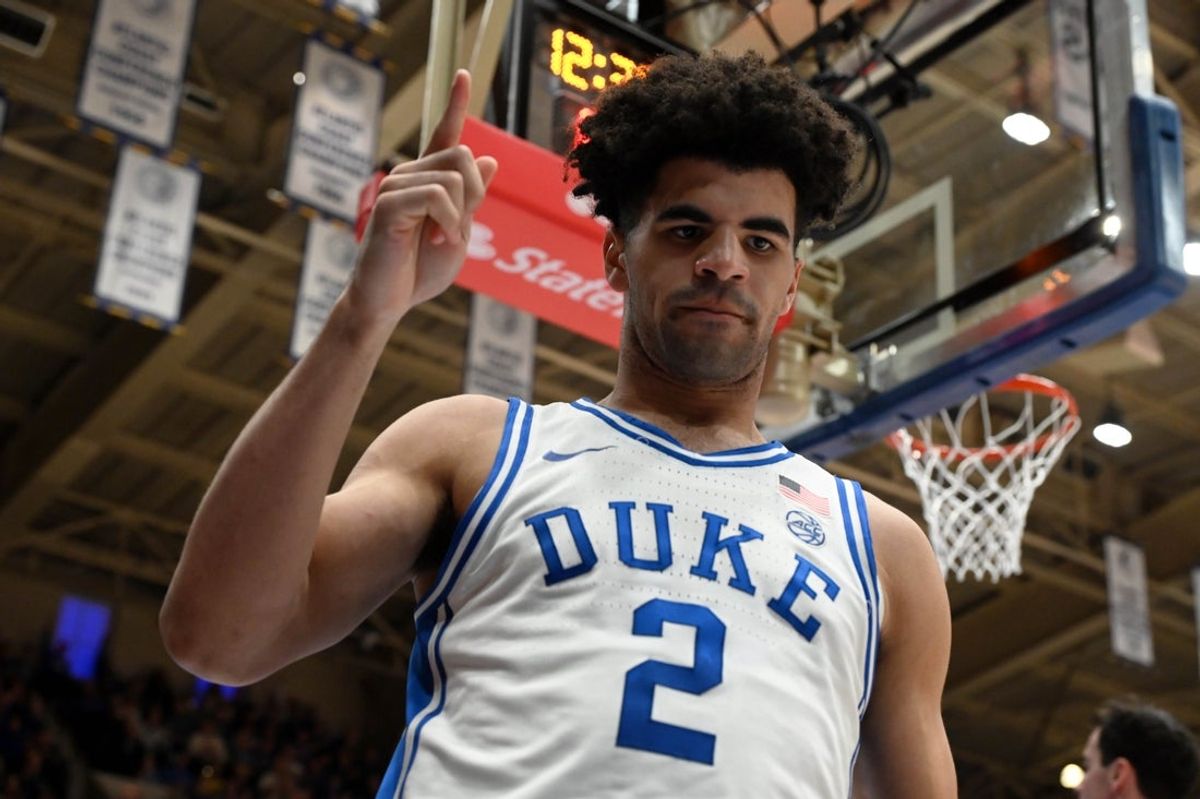 Feb 14, 2026; Durham, North Carolina, USA; Duke Blue Devils guard Cayden Boozer (2) reacts after scoring and being fouled during the second half against the Duke Blue Devils at Cameron Indoor Stadium. Mandatory Credit: Rob Kinnan-Imagn Images