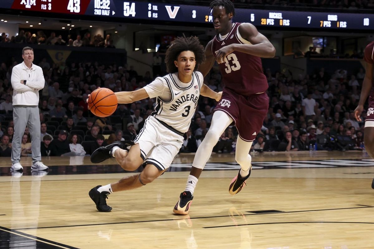 Feb 14, 2026; Nashville, Tennessee, USA;  Vanderbilt Commodores guard Tyler Tanner (3) drives baseline against the Texas A&M Aggies during the second half at Memorial Gymnasium. Mandatory Credit: Steve Roberts-Imagn Images