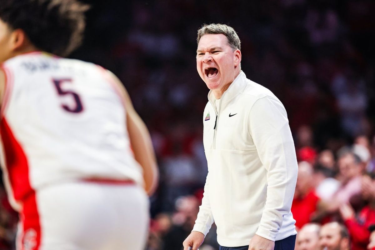 Feb 14, 2026; Tucson, Arizona, USA; Arizona Wildcats head coach Tommy Lloyd yells out to players during the first half of the game against the Texas Tech Red Raiders at McKale Memorial Center. Mandatory Credit: Aryanna Frank-Imagn Images
