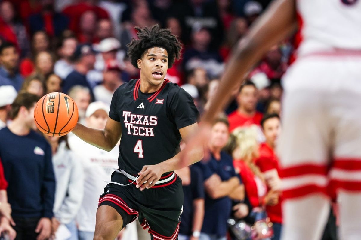 Feb 14, 2026; Tucson, Arizona, USA; Texas Tech Red Raiders guard Christian Anderson (4) dribbles the ball down the court during the first half of the game against the Arizona Wildcats at McKale Memorial Center. Mandatory Credit: Aryanna Frank-Imagn Images