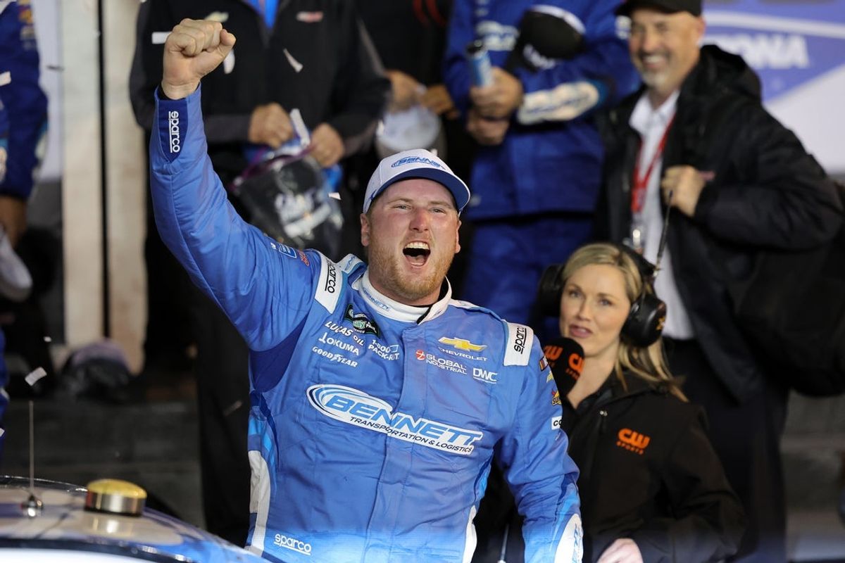 Feb 14, 2026; Daytona Beach, Florida, USA; O’Reilly Auto Parts Series driver Austin Hill (21) reacts after winning the United Rentals 300 at Daytona International Speedway. Mandatory Credit: Mike Dinovo-Imagn Images