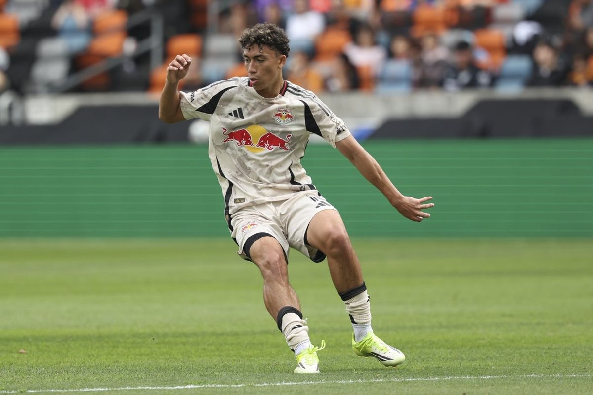 Feb 14, 2026; Houston, Texas, USA;  New York Red Bulls  attacker  Julian Hall (16) in action during the first half against the Houston Dynamo FC at Shell Energy Stadium. Mandatory Credit: Troy Taormina-Imagn Images