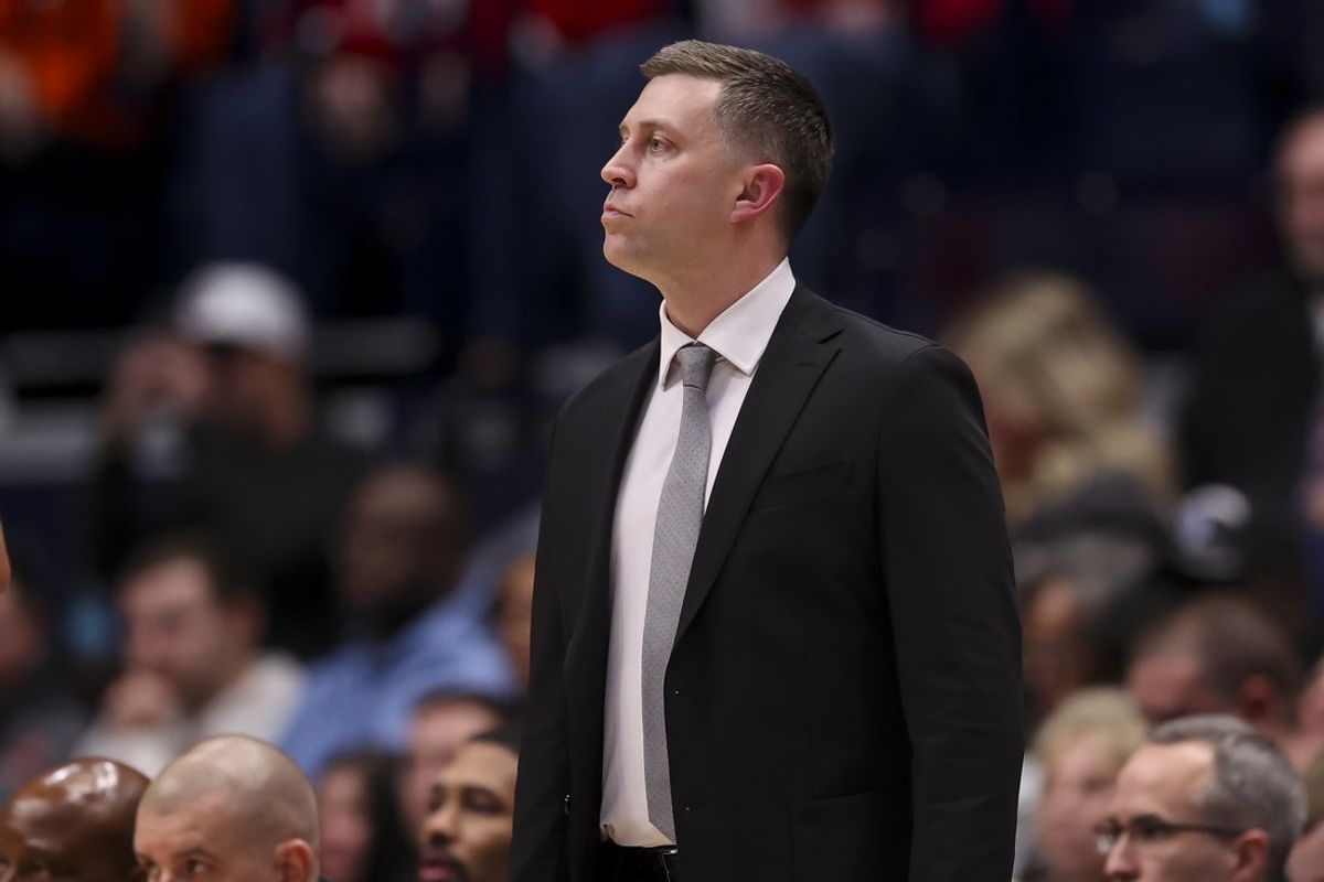 Feb 14, 2026; Nashville, Tennessee, USA;  Ohio State Buckeyes head coach Jake Diebler watches his team against the Virginia Cavaliers during the second half at Bridgestone Arena. Mandatory Credit: Steve Roberts-Imagn Images