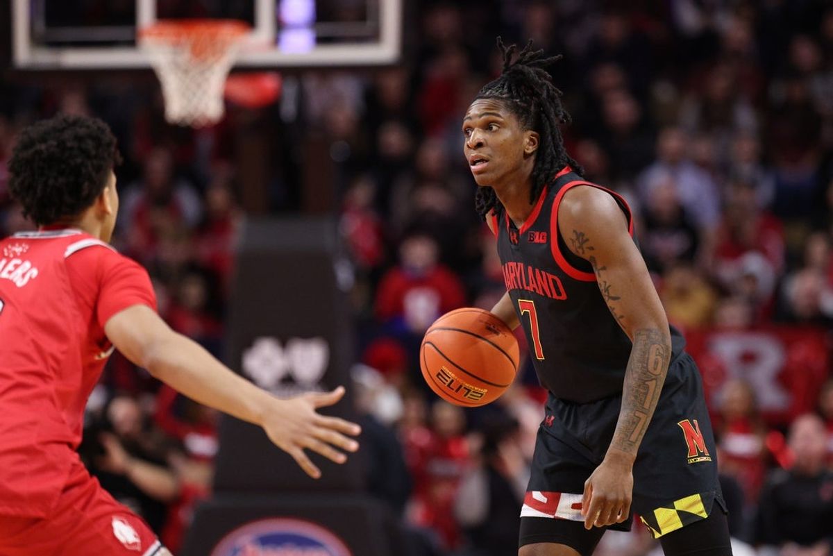 Feb 15, 2026; Piscataway, New Jersey, USA; Maryland Terrapins guard Andre Mills (7) dribbles against against the Rutgers Scarlet Knights during the first half at Jersey Mike's Arena. Mandatory Credit: Vincent Carchietta-Imagn Images