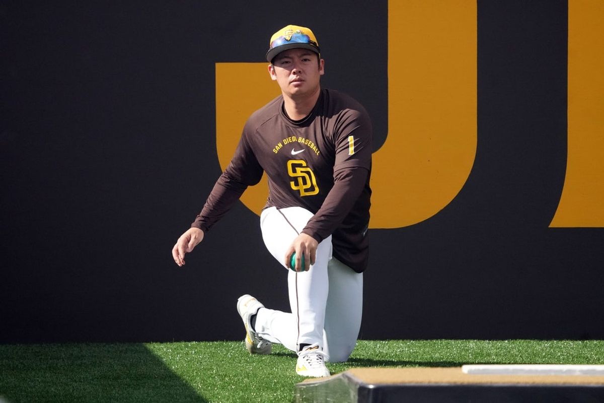 Feb 15, 2026; Peoria, AZ, USA; San Diego Padres pitcher Yuki Matsui (1) stretches during spring training camp. Mandatory Credit: Rick Scuteri-Imagn Images