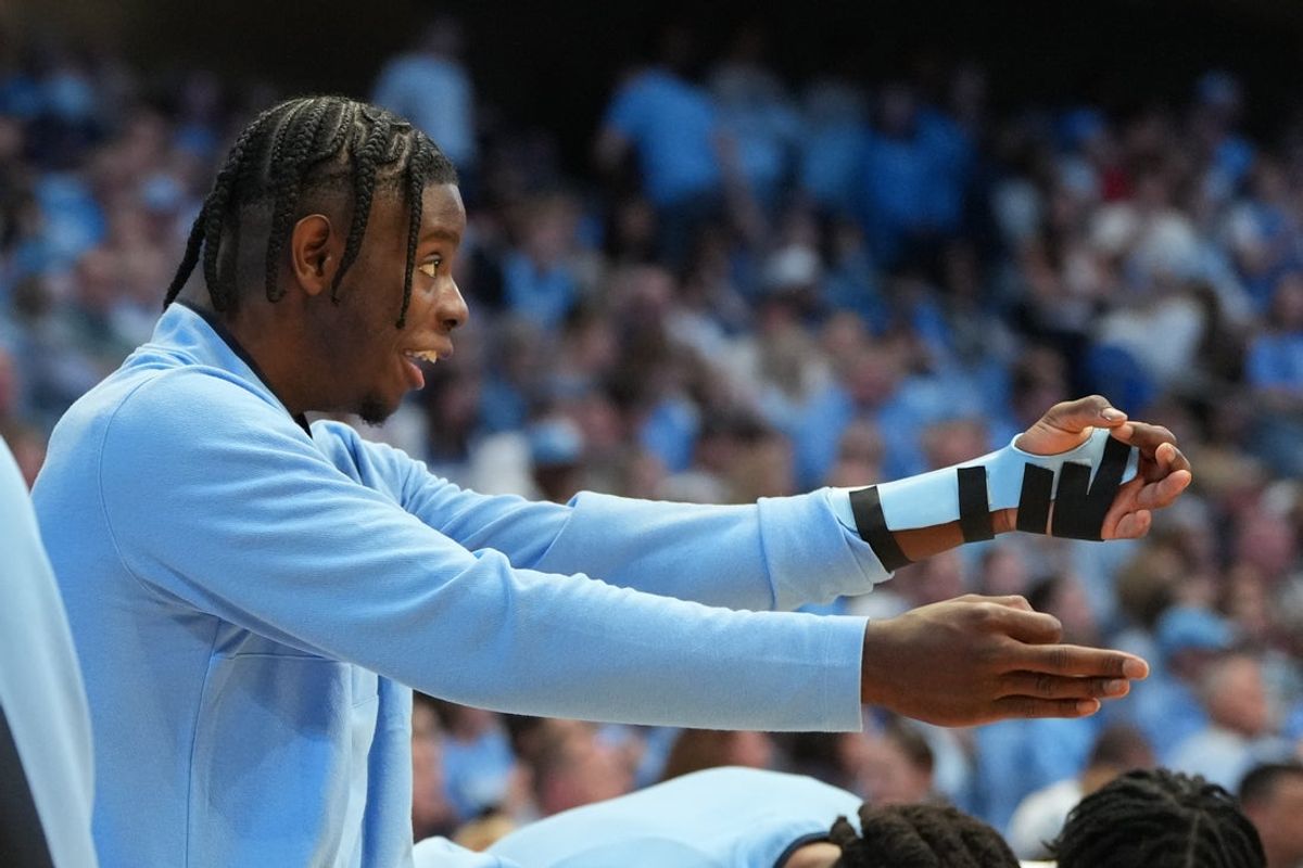 Feb 14, 2026; Chapel Hill, North Carolina, USA; North Carolina Tar Heels forward Caleb Wilson (8) on the bench in the second half at Dean E. Smith Center. Mandatory Credit: Bob Donnan-Imagn Images
