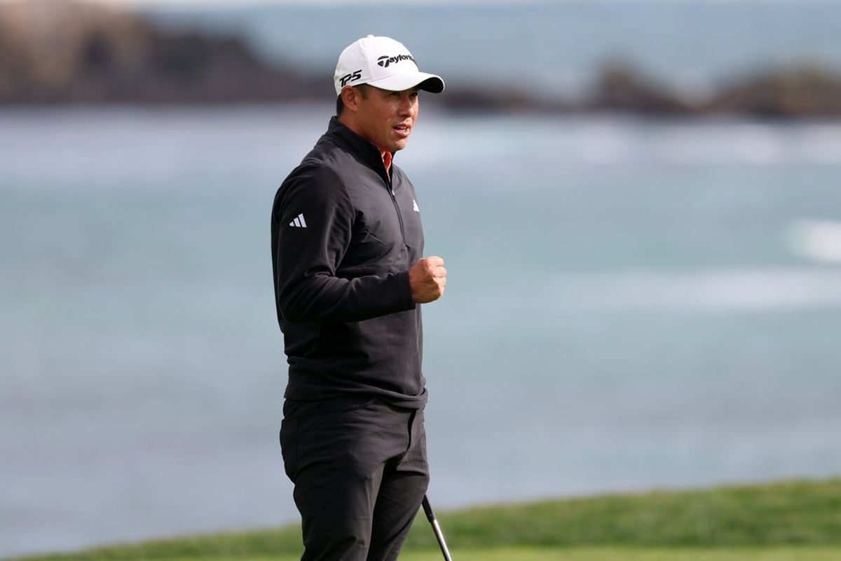 Collin Morikawa celebrates after winning on the 18th hole during the final round of the Pebble Beach Pro-Am golf tournament at Pebble Beach Golf Links. Mandatory Credit: Kiyoshi Mio-Imagn Images