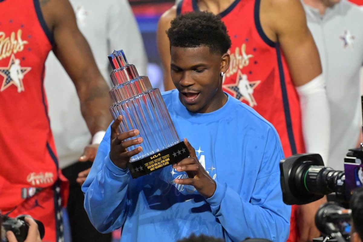 Feb 15, 2026; Inglewood, California, USA; Team USA Stars guard Anthony Edwards (5) of the Minnesota Timberwolves celebrates with the MVP trophy after the championship game during the 75th NBA All Star Game at Intuit Dome. Mandatory Credit: Jayne Kamin-Oncea-Imagn Images