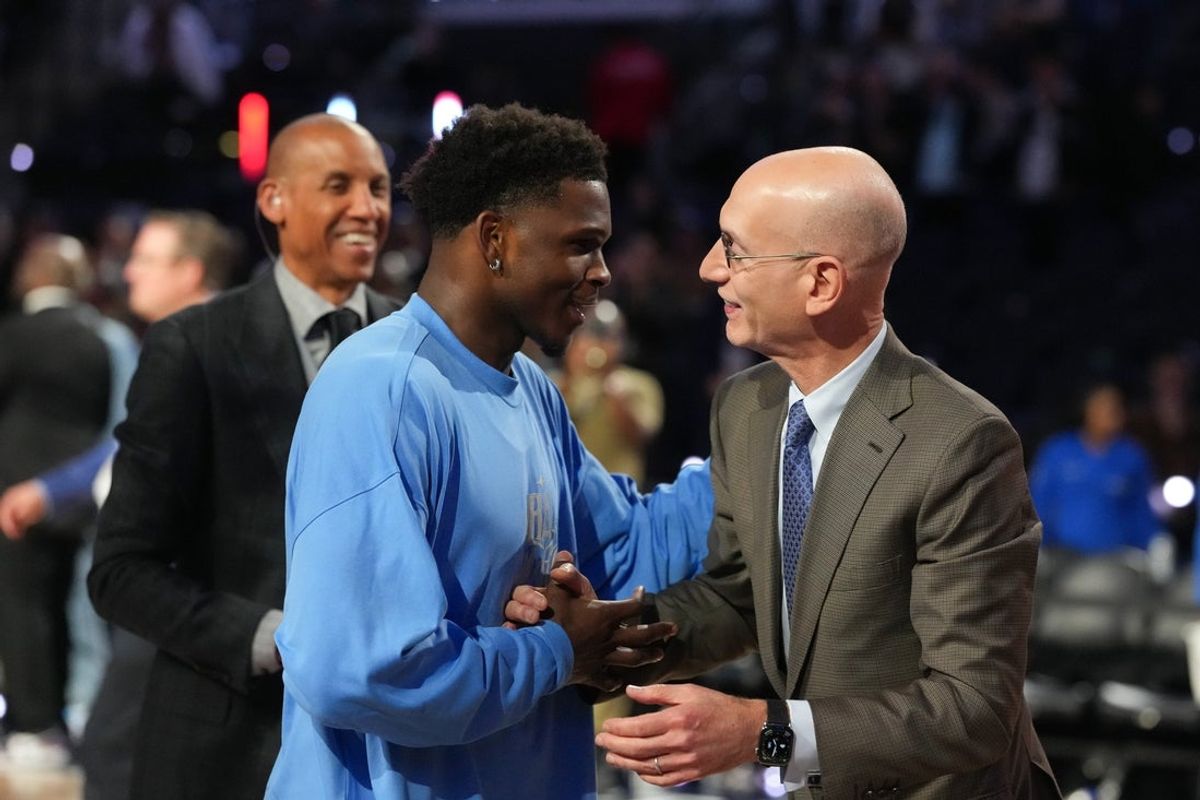 Feb 15, 2026; Inglewood, California, USA; Team USA Stars guard Anthony Edwards (5) of the Minnesota Timberwolves shakes hands with NBA commissioner Adam Silver after the 75th NBA All Star Game at Intuit Dome. Mandatory Credit: Kirby Lee-Imagn Images