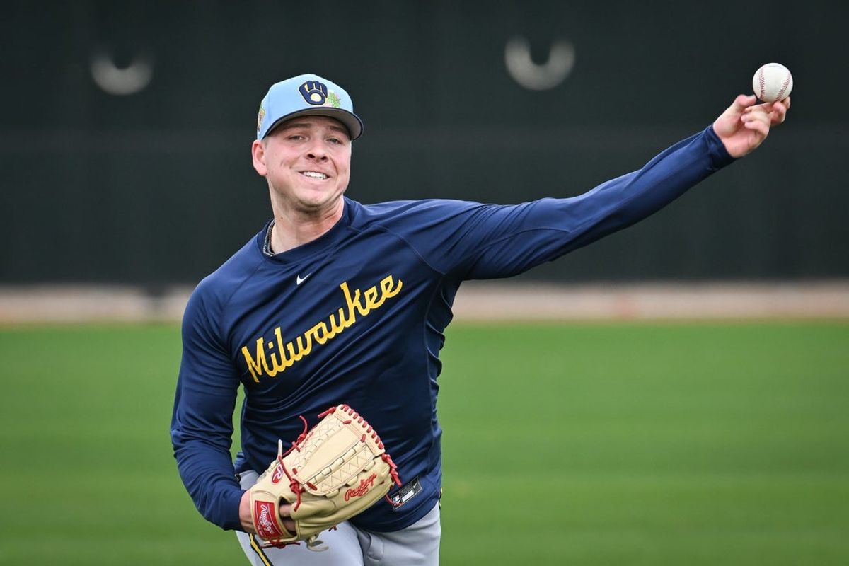 Milwaukee Brewers pitcher Kyle Harrison throws in the outfield during spring training workouts Monday, February 16, 2026, at American Family Fields of Phoenix in Phoenix, Arizona.