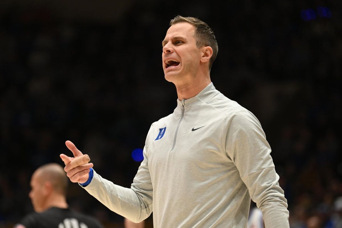 Feb 16, 2026; Durham, North Carolina, USA;  Duke Blue Devils head coach Jon Scheyer reacts during the during the first half against the Syracuse Orange at Cameron Indoor Stadium. Mandatory Credit: Zachary Taft-Imagn Images