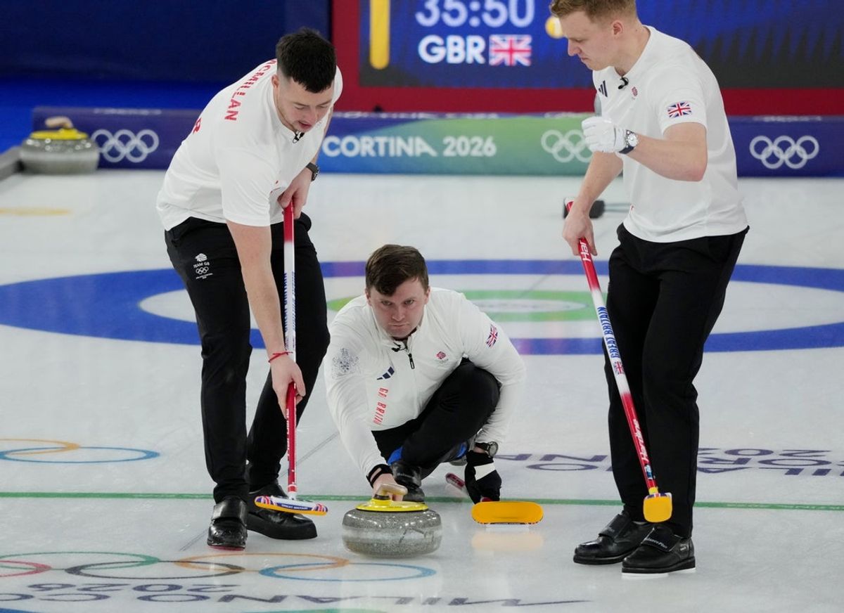 Feb 17, 2026; Cortina d'Ampezzo, Italy;  Bruce Mouat in action against Canada in a men's curling round robin match during the Milano Cortina 2026 Olympic Winter Games at Cortina Curling Olympic Stadium. Mandatory Credit: Eric Bolte-Imagn Images