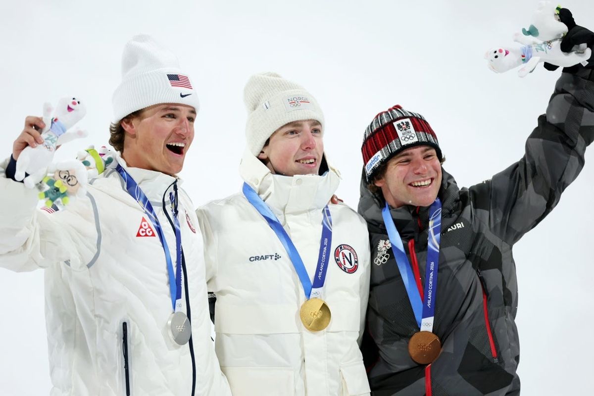 Feb 17, 2026; Livigno, Italy; Silver medalist Mac Forehand of the United States, gold medalist Tormod Frostad of Norway, and bronze medalist Matej Svancer of Austria during the medal ceremony for the men's big air final during the Milano Cortina 2026 Olympic Winter Games at Livigno Snow Park. Mandatory Credit: Nathan Ray Seebeck-Imagn Images