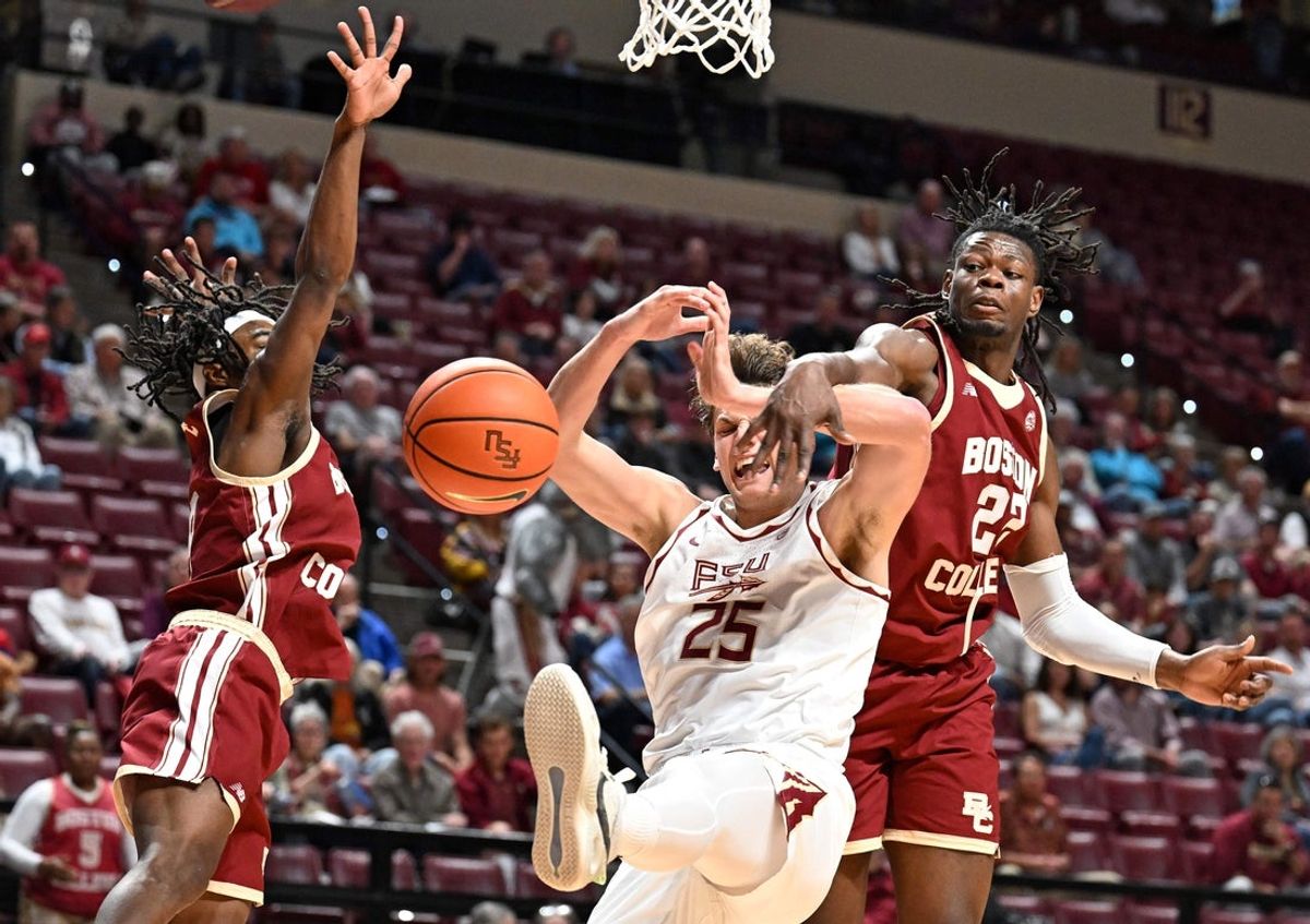 Feb 17, 2026; Tallahassee, Florida, USA; Florida State Seminoles forward Alex Steen (25) has the ball knocked away by Boston College Eagles forward Jayden Hastings (22) during the first half at Donald L. Tucker Center. Mandatory Credit: Melina Myers-Imagn Images