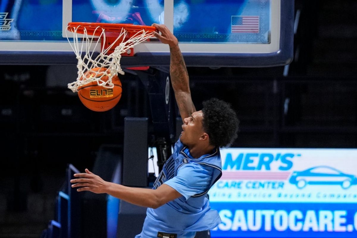 Feb 17, 2026; Cincinnati, Ohio, USA;  Villanova Wildcats guard Acaden Lewis (55) dunks the ball against the Xavier Musketeers in the first half at the Cintas Center. Mandatory Credit: Aaron Doster-Imagn Images