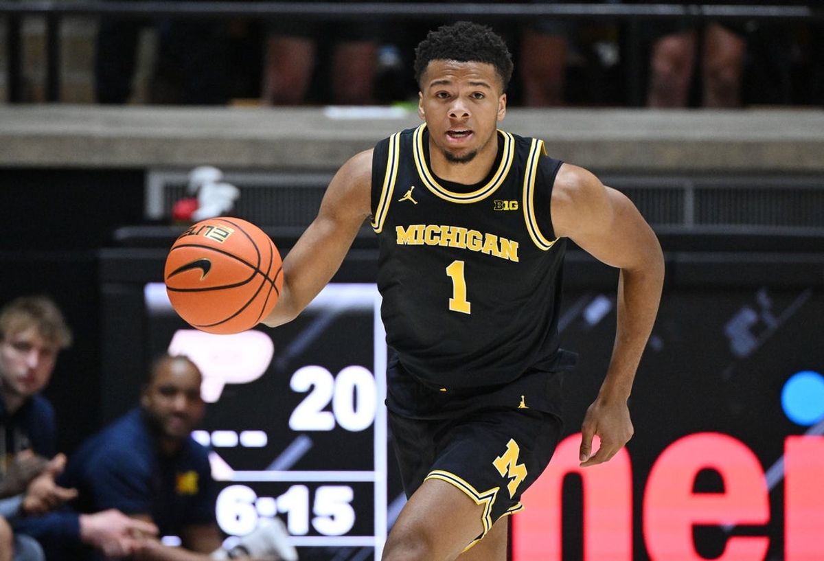 Feb 17, 2026; West Lafayette, Indiana, USA; Michigan Wolverines guard Trey McKenney (1) drives the ball down court during the first half against the Purdue Boilermakers at Mackey Arena. Mandatory Credit: Marc Lebryk-Imagn Images
