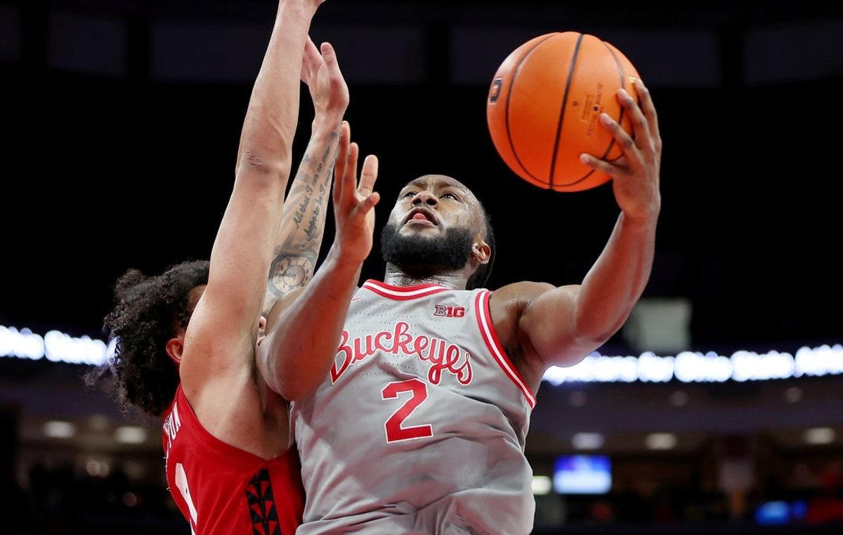 Feb 17, 2026; Columbus, Ohio, USA;  Ohio State Buckeyes guard Bruce Thornton (2) drives to the basket as Wisconsin Badgers guard Braeden Carrington (0) defends during the second half at Value City Arena. Mandatory Credit: Joseph Maiorana-Imagn Images