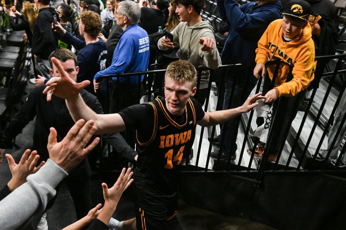 Feb 17, 2026; Iowa City, Iowa, USA; Iowa Hawkeyes guard Bennett Stirtz (14) reacts while coming off the court after the game against the Nebraska Cornhuskers at Carver-Hawkeye Arena. Mandatory Credit: Jeffrey Becker-Imagn Images