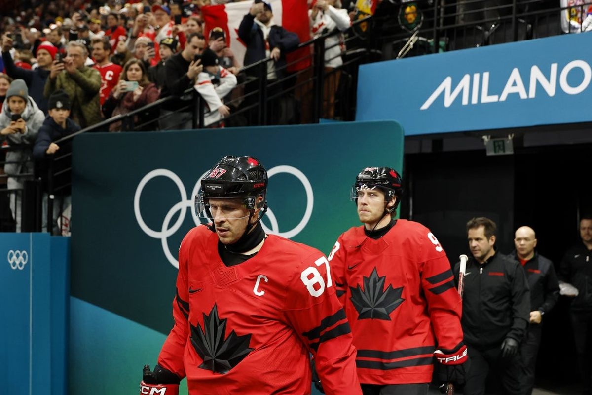 Feb 18, 2026; Milan, Italy; Sidney Crosby of Canada walks out to the ice before a men's ice hockey quarterfinal during the Milano Cortina 2026 Olympic Winter Games at Milano Santagiulia Ice Hockey Arena. Mandatory Credit: Geoff Burke-Imagn Images