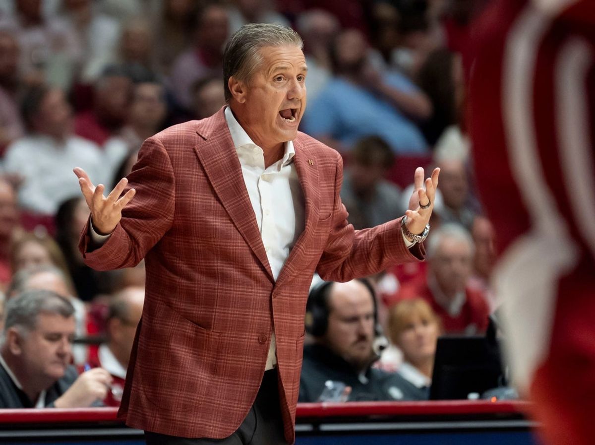 Feb 18, 2026; Tuscaloosa, AL, USA; Arkansas John Calipari talks to an official during the game with Alabama at Coleman Coliseum. Mandatory Credit: Gary Cosby Jr.-Tuscaloosa News