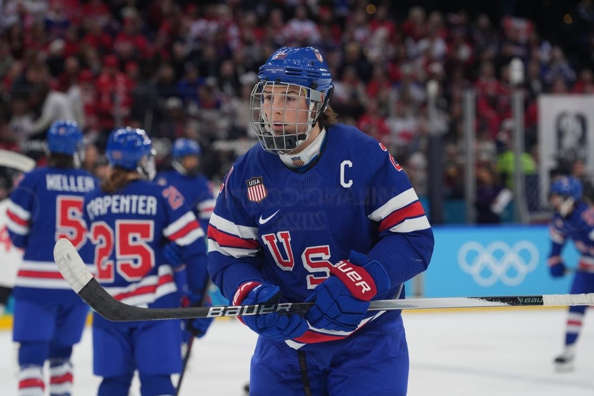 Feb 19, 2026; Milan, Italy; Hilary Knight (21) of the United States on the ice in the women's ice hockey gold medal game against Canada during the Milano Cortina 2026 Olympic Winter Games at Milano Santagiulia Ice Hockey Arena. Mandatory Credit: Amber Searls-Imagn Images