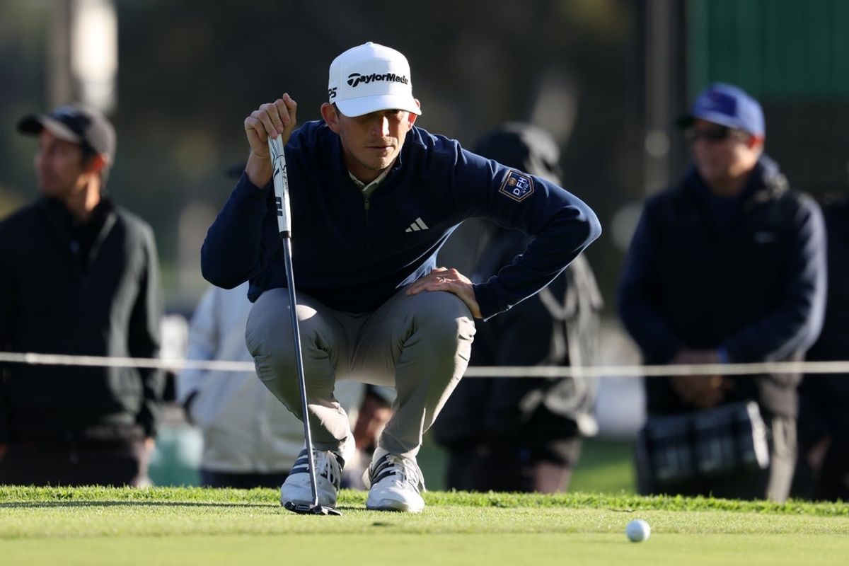 Feb 19, 2026; Pacific Palisades, California, USA;    Jacob Bridgeman lines up his putt on the 18th green during the first round of the The Genesis Invitational golf tournament at Riviera Country Club. Mandatory Credit: Kiyoshi Mio-Imagn Images