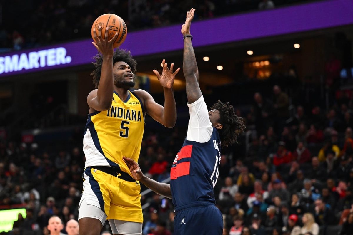 Feb 19, 2026; Washington, District of Columbia, USA; Indiana Pacers forward Jarace Walker (5) shoots over Washington Wizards guard Kadary Richmond (19) during the second half at Capital One Arena. Mandatory Credit: Brad Mills-Imagn Images